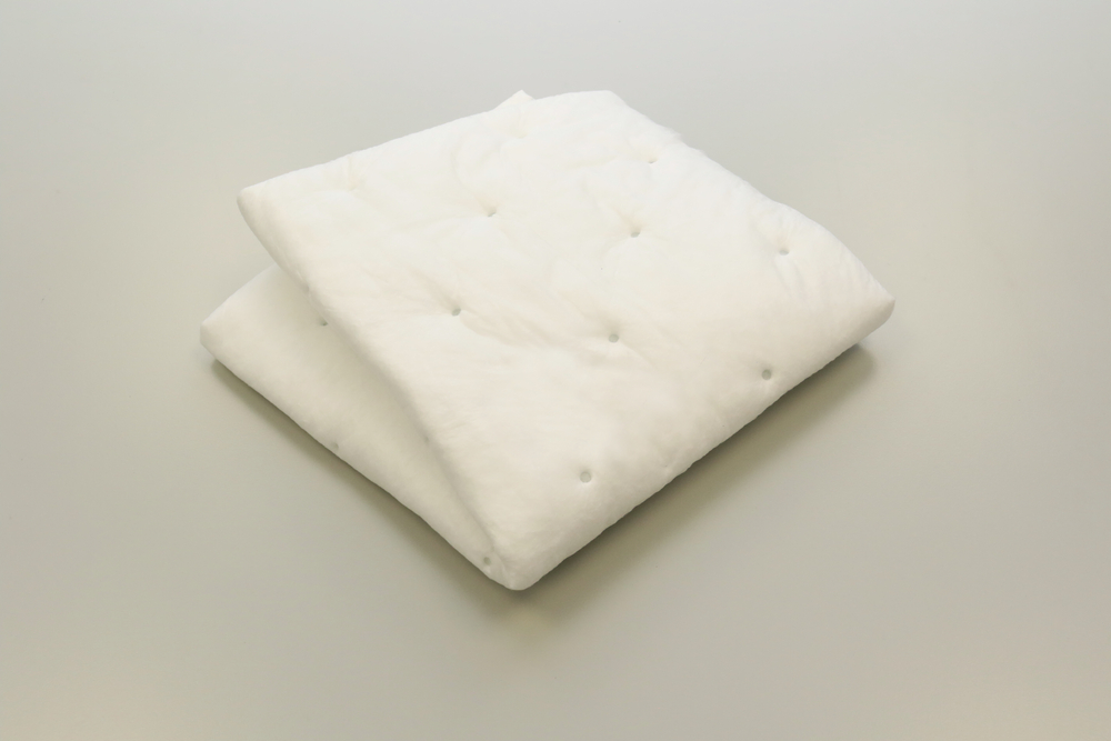 Oil absorbent pads